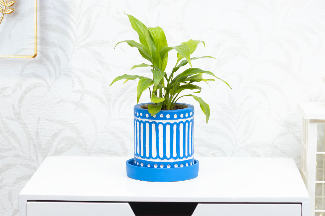 Peaceful Peace Lily In Blue Ceramic Vase