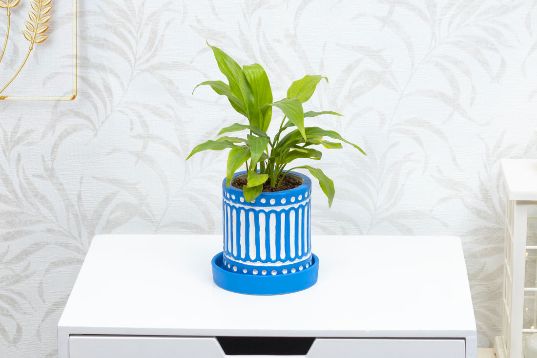 Peaceful Peace Lily In Blue Ceramic Vase