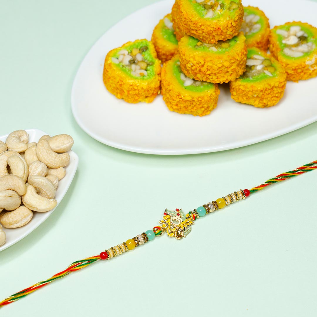 Beautiful Om Rakhi With Dry fruits N Sweets