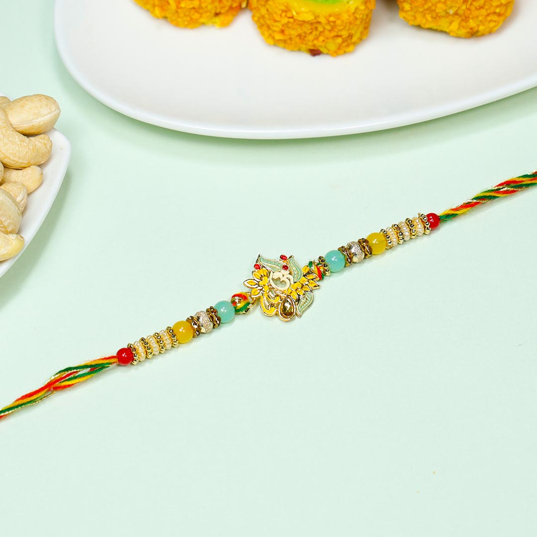 Beautiful Om Rakhi With Dry fruits N Sweets