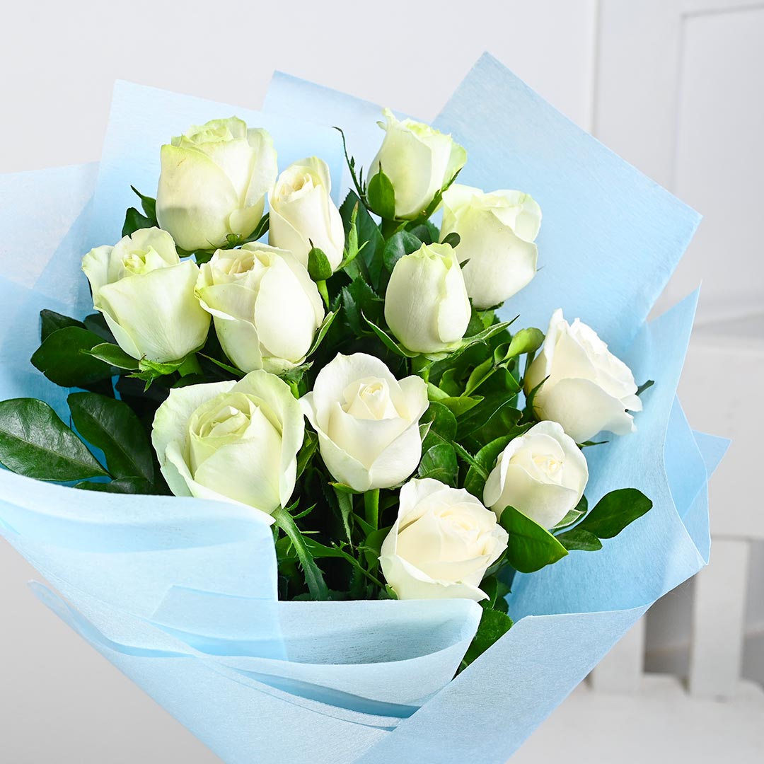 Blossom White Roses In Blue Wrapper