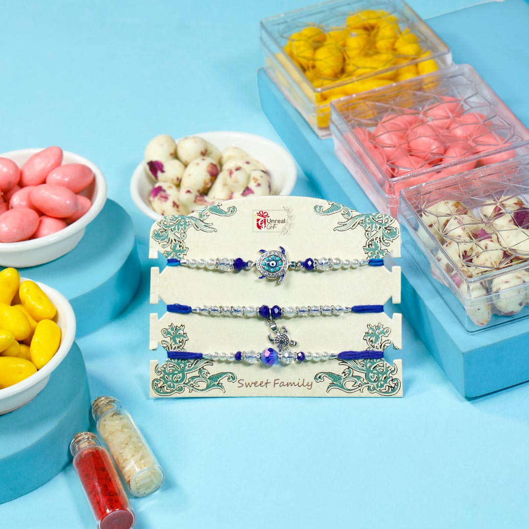 Evil Eye Rakhi Set With Assorted Sweets