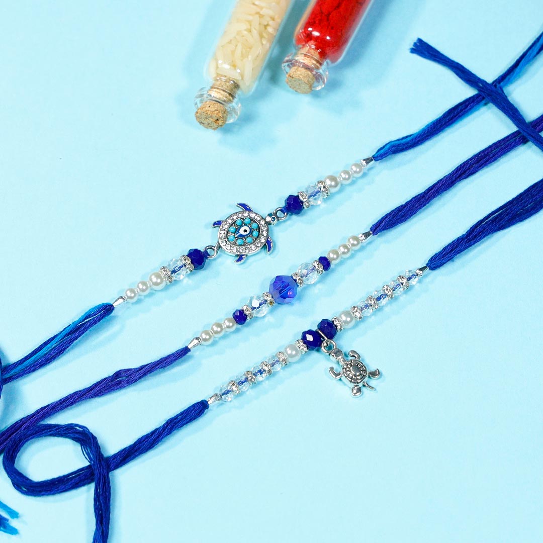 Evil Eye Rakhi Set With Assorted Sweets