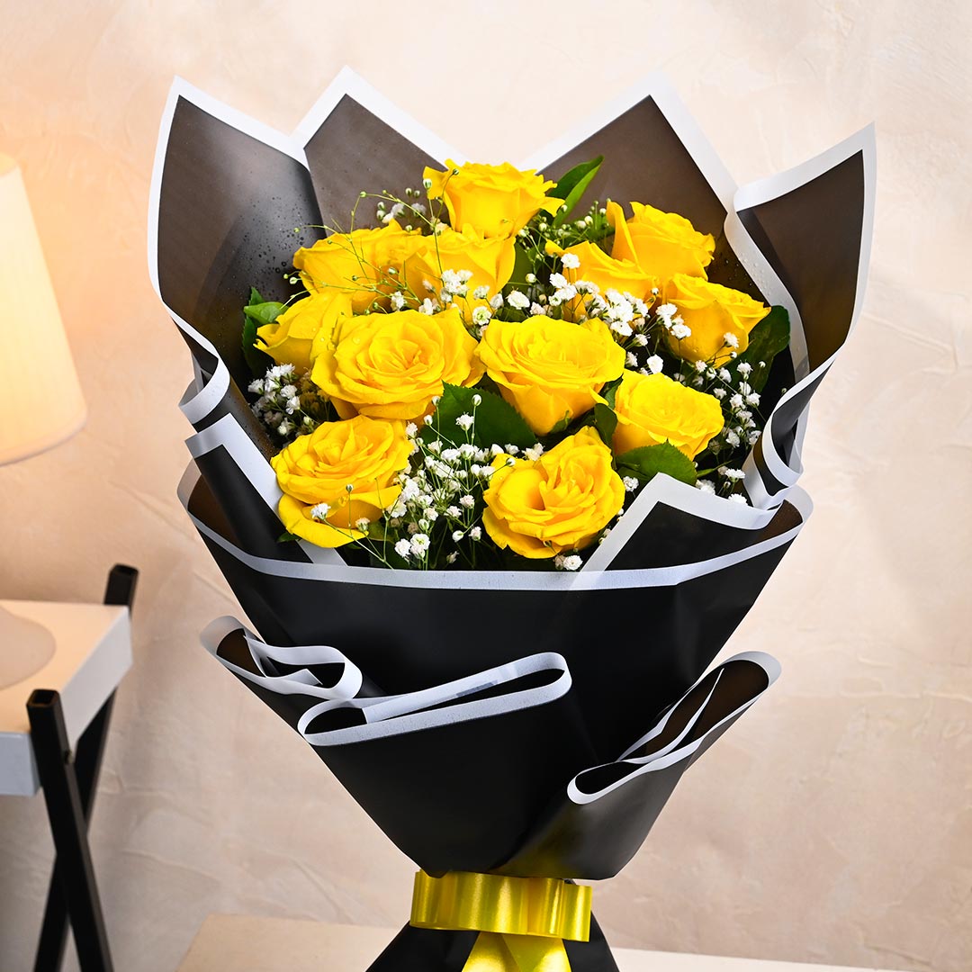 Mesmerizing Yellow Roses In Black Paper