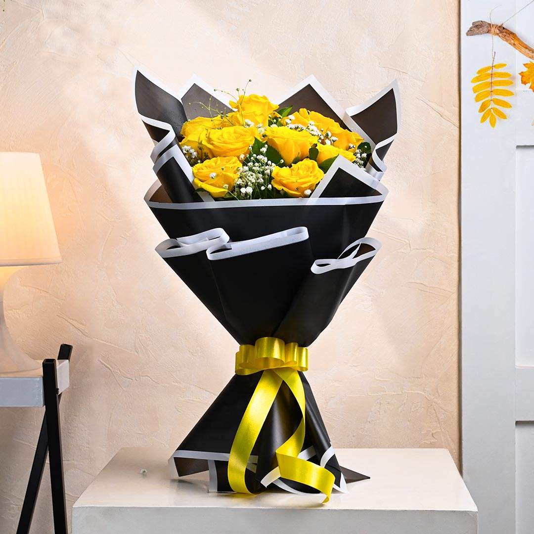 Mesmerizing Yellow Roses In Black Paper