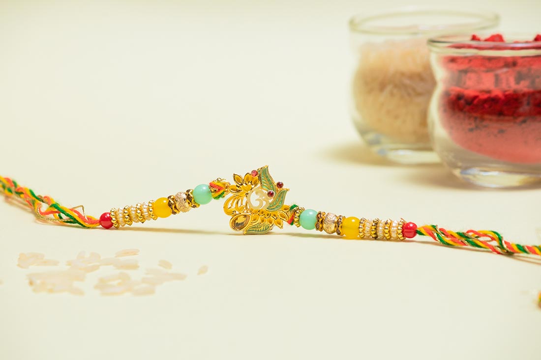 Multi Colored Rakhi And Chocolate Combo