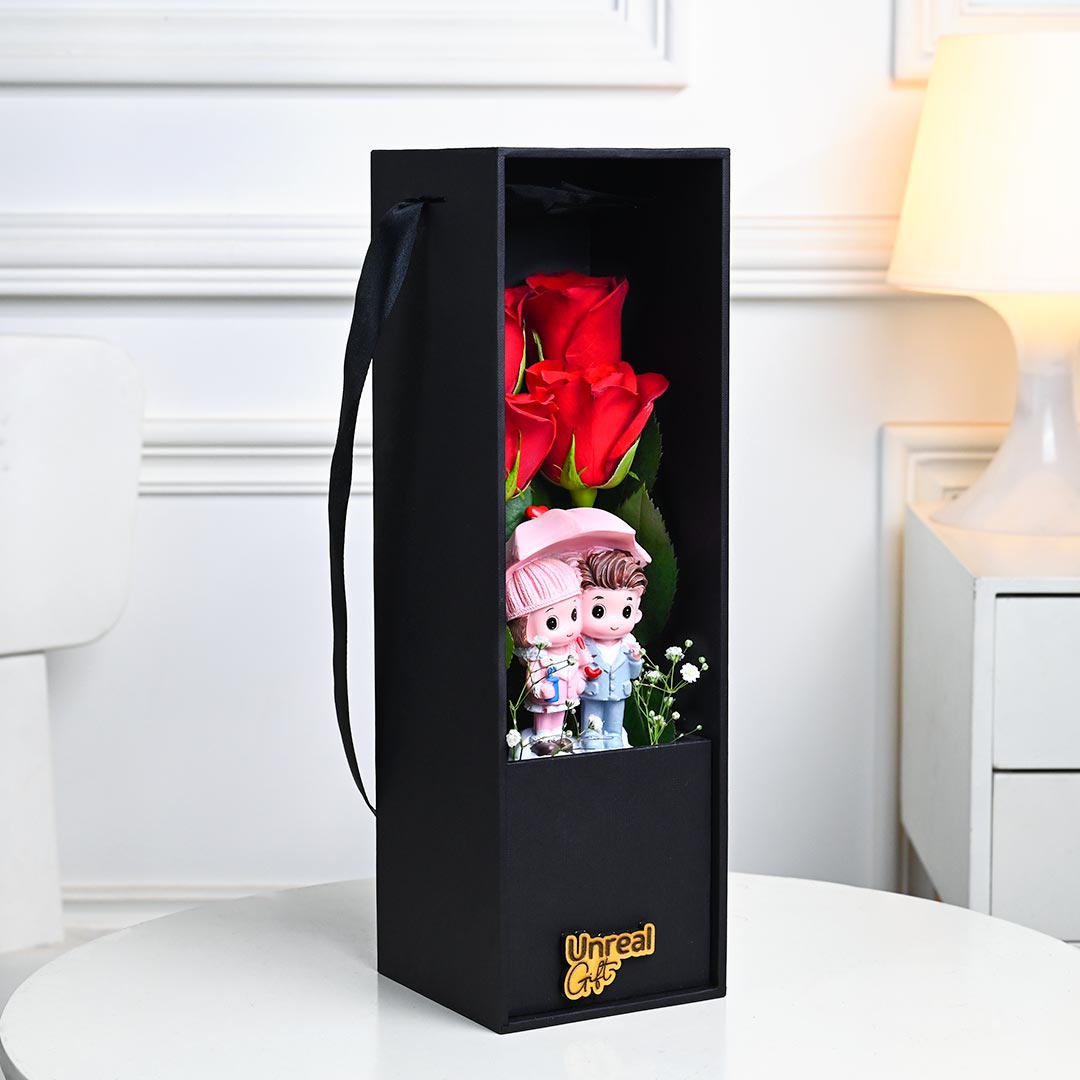 Red Roses In Black Box With Cute Couple