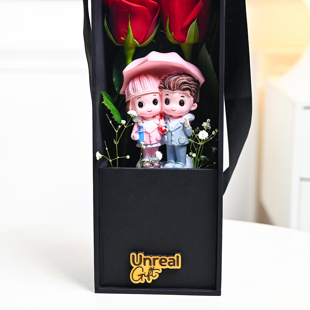 Red Roses In Black Box With Cute Couple