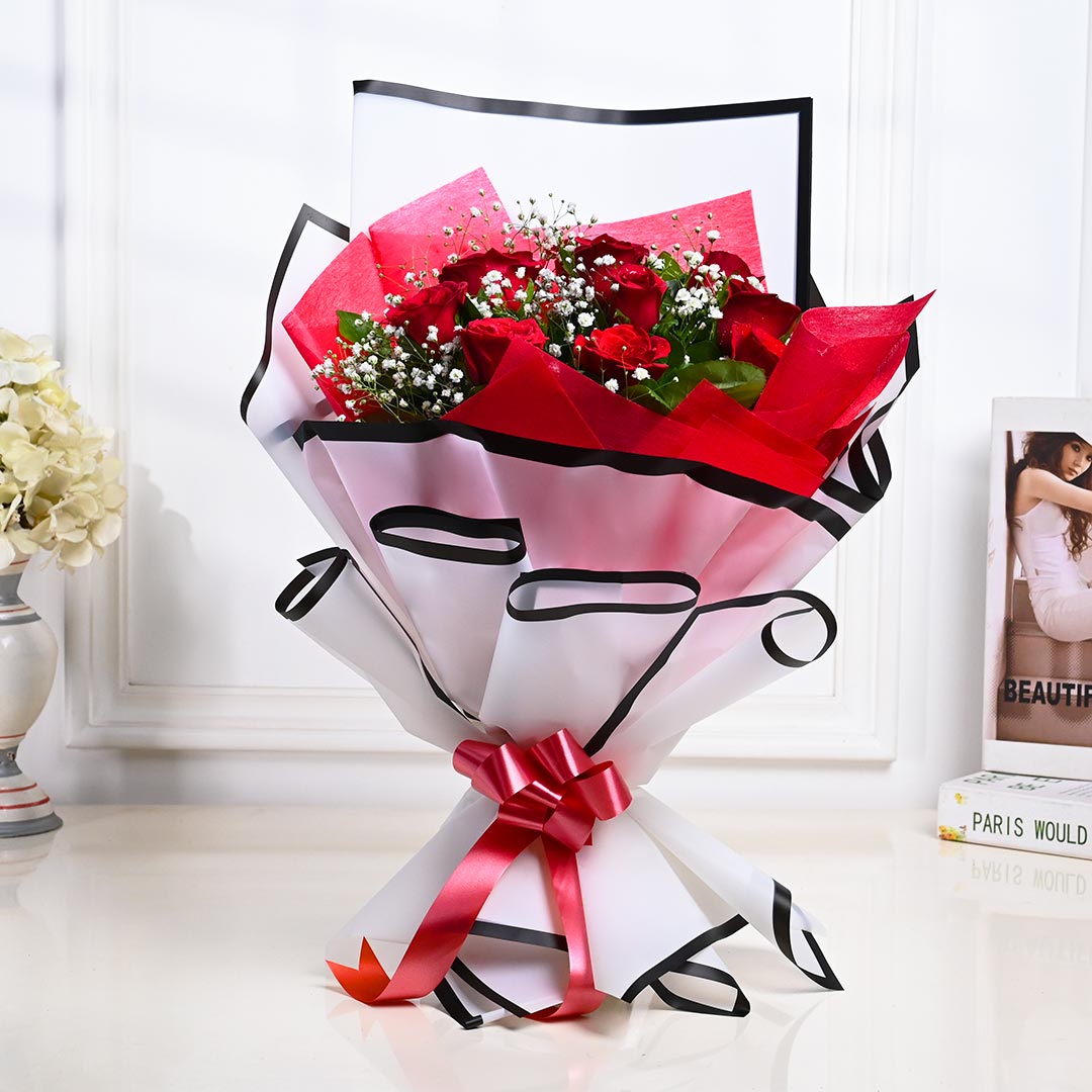 Buy Red Roses Wrapped In Elagance