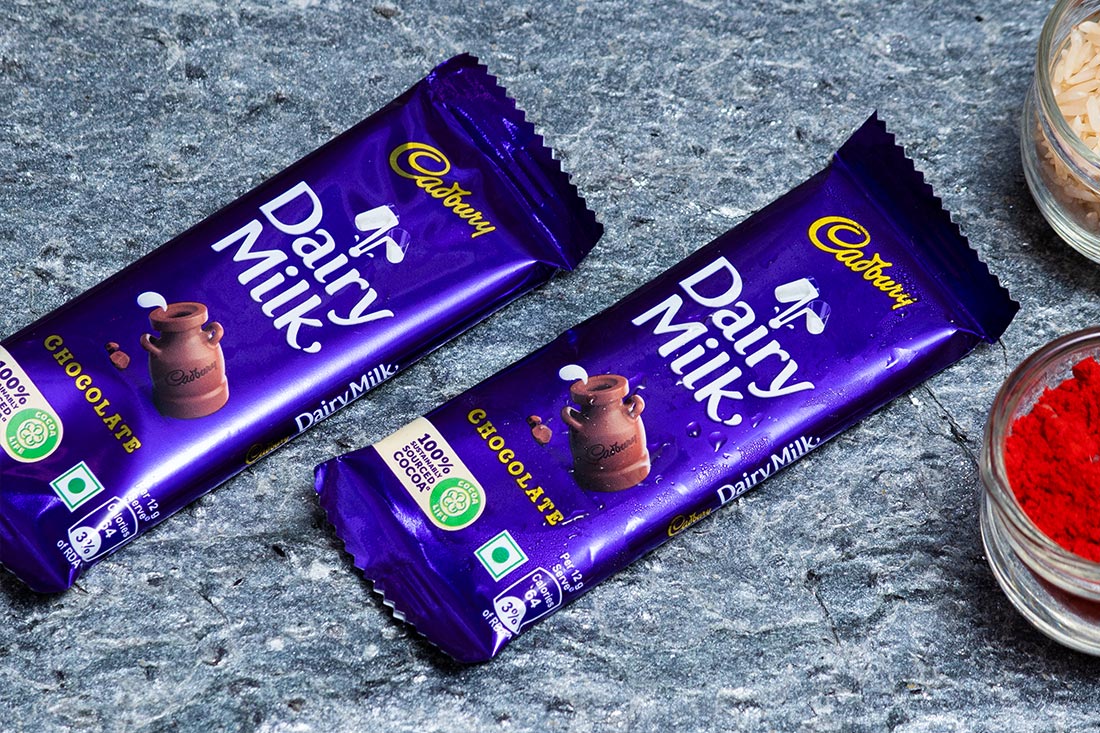 Rudrakash Embedded Rakhi Dairy Milk Combo