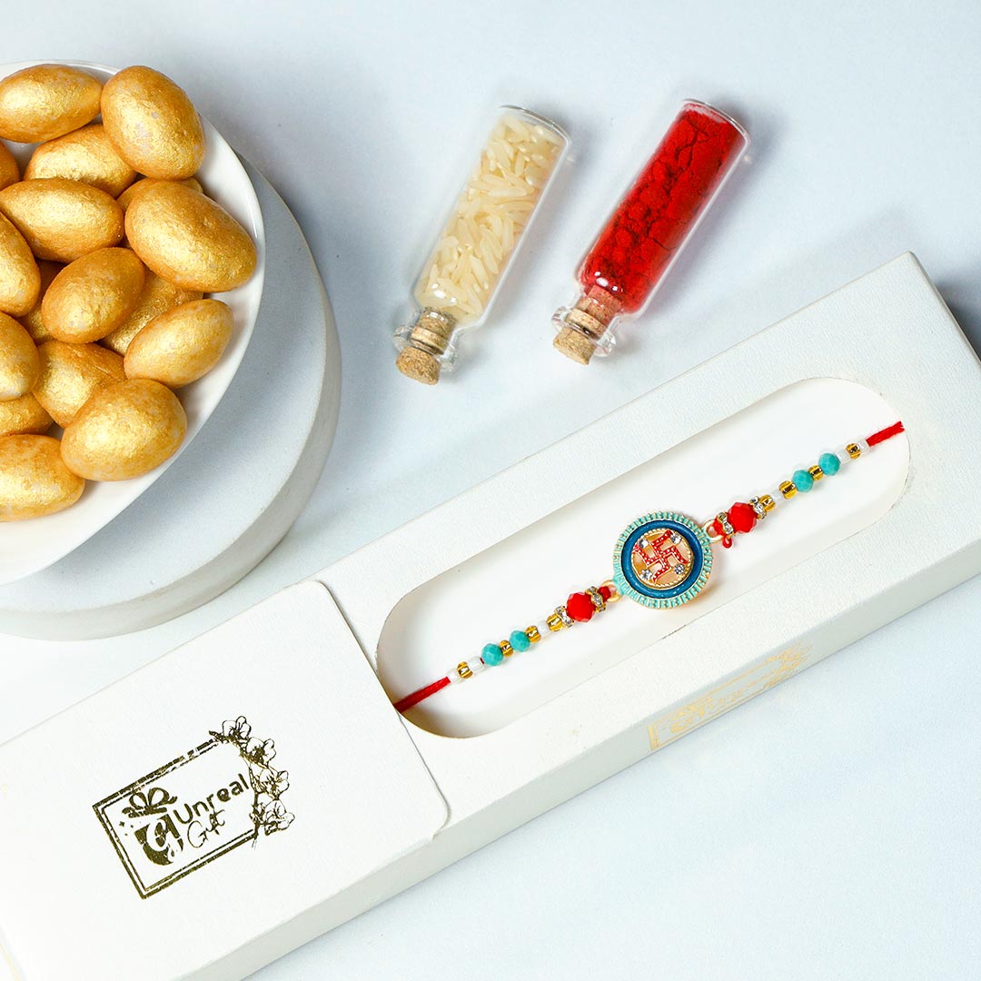 Swastika Rakhi With Almond Saffire Dragees